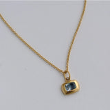 Cora Pendant Necklace with Sapphire Charm Necklace Mari Beltran